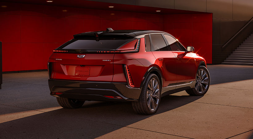 Rear 3/4 view of the 2024 Cadillac LYRIQ Sport trim.