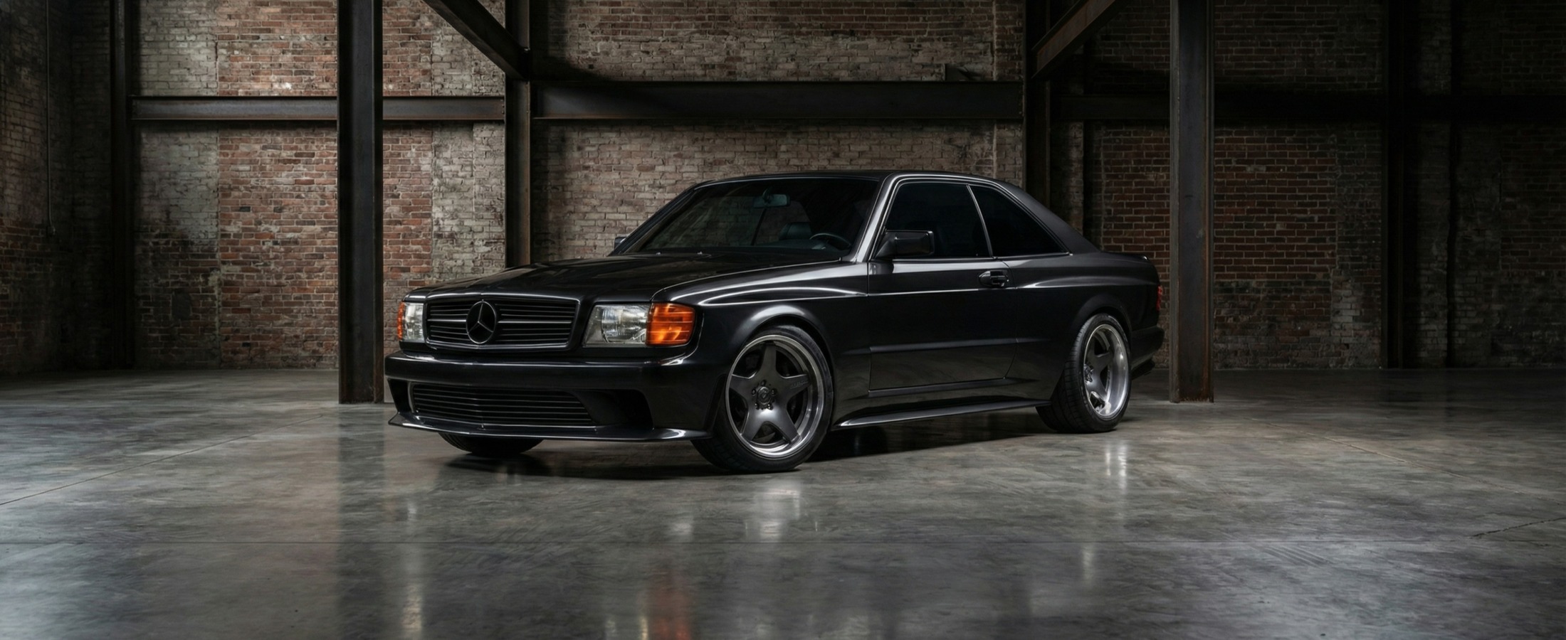 Renntech just announced something special.

A 7.5-liter naturally aspirated V12. In a classic Mercedes SEC. With a seven-speed manual gearbox. Only 12 will ever be built.

660 horsepower. 650 lb-ft of torque. No turbos. No superchargers. Just displacement and hand-formed equal-length headers. This thing is going to sound divine.

And they paired it with a seven-speed manual. Rear-wheel drive. Three pedals. In 2027.

The SEC is a top-five Mercedes design for me. The C126 has aged beautifully — clean, elegant, timeless. Renntech gave it a widebody kit with functional aero, 19-inch forged wheels, and the powertrain it always deserved.

First deliveries December 2027. Only 12 examples worldwide.